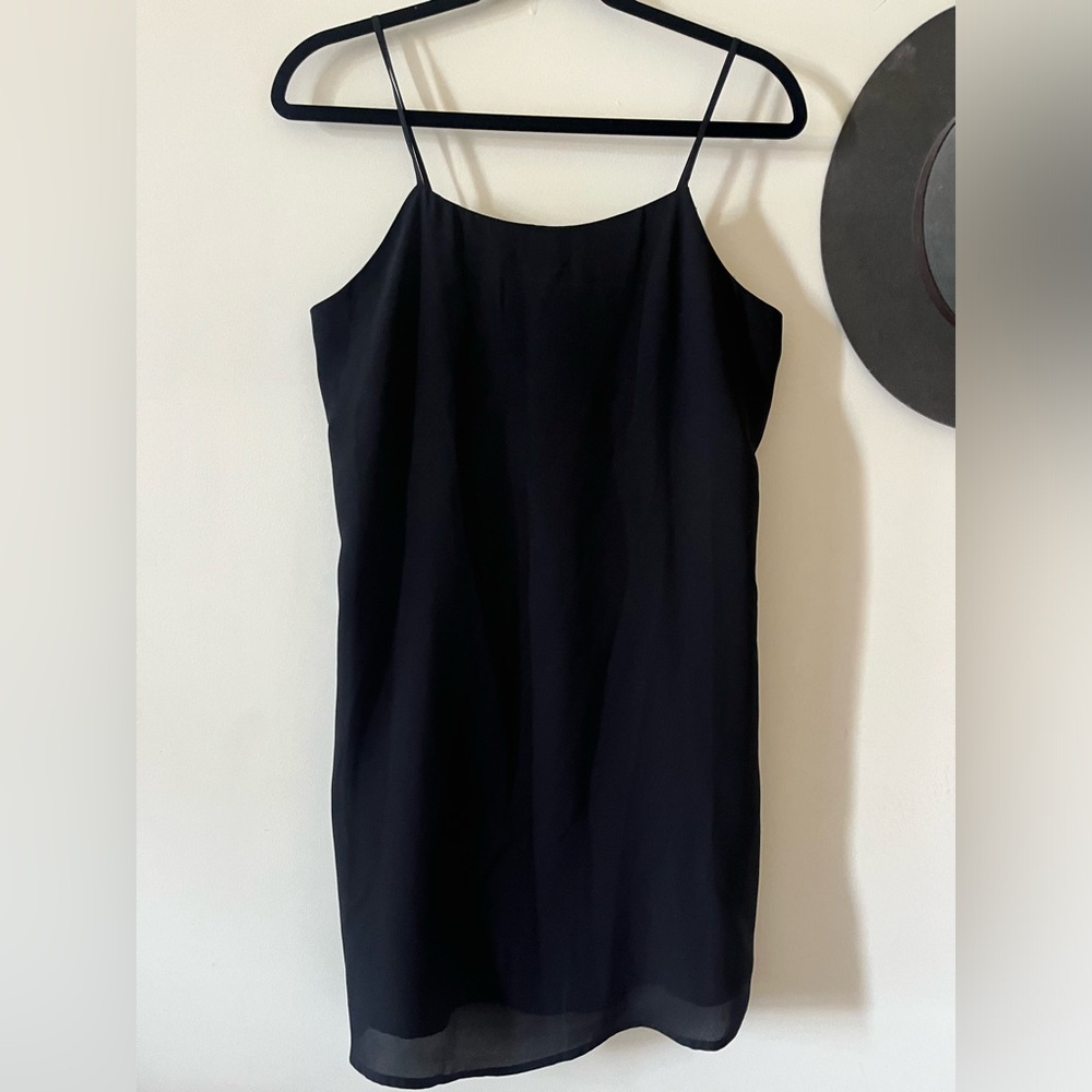Super cute short black dress with bow